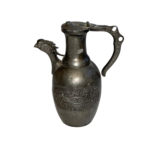 160 - Chinese wine jug, the body decorated with birds, phoenix head spout, 15cm high.