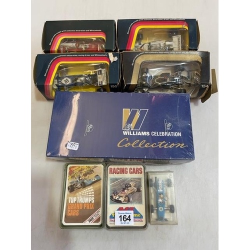 164 - Four Corgi Formula 1 cars, two packs F1 Top Trumps, Williams Celebration Collection and Majorette Mo... 