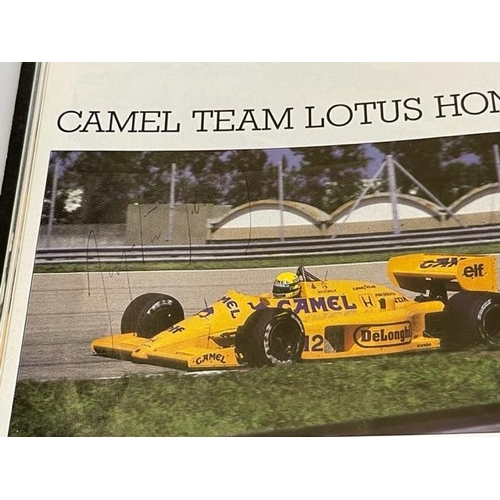 166 - Two Formula 1 programmes, one signed Nigel Mansell with certificate, other Ayrton Senna.