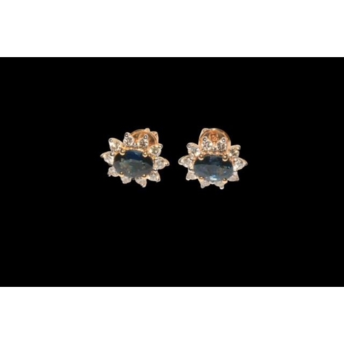 190 - Pair of sapphire and diamond cluster earrings set in 18 carat yellow gold, sapphire weight approx 1.... 