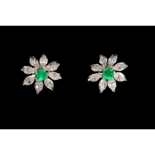 193 - Pair emerald and diamond 18 carat gold earrings, the flower settings with eight diamond petals, sold... 