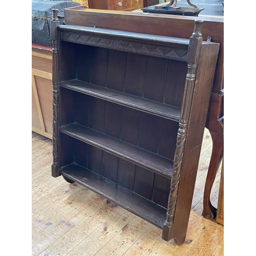 376 - Oak three tier wall shelf with turned pillars, 109cm by 86cm by 19cm.