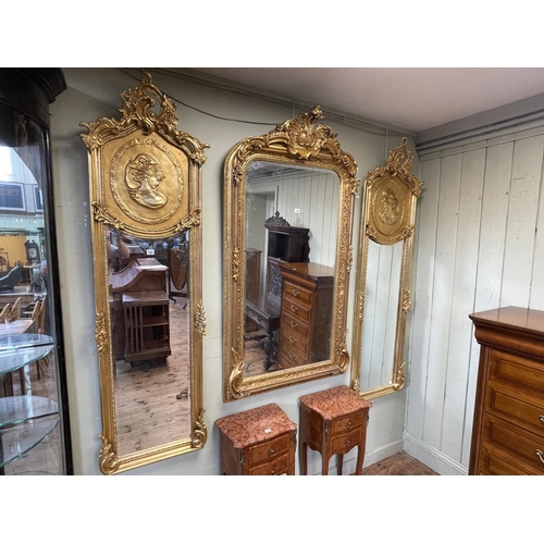 385 - Pair rectangular gilt framed lady portrait bevelled wall mirrors, 178cm by 52cm.