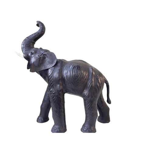 52 - Liberty style leather elephant.