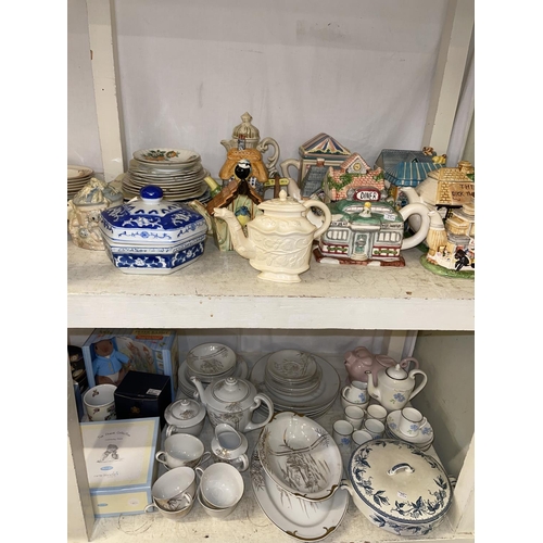 87 - Two full shelves of china, novelty teapots, collectors plates, Piggin Pigs, tableware, Hine Brandy, ... 