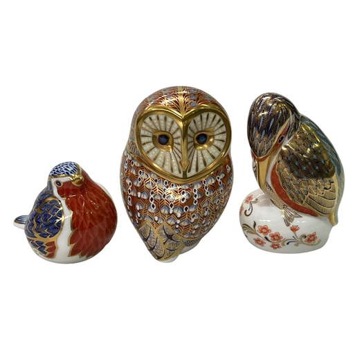 301 - Three Royal Crown Derby paperweights.