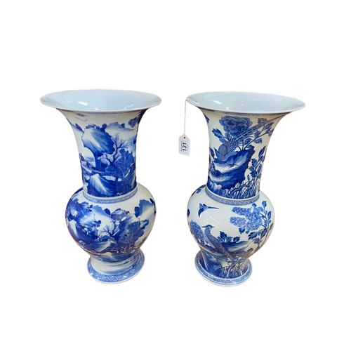 131 - Two large Chinese blue and white vases with landscape and exotic bird decoration, 44cm.