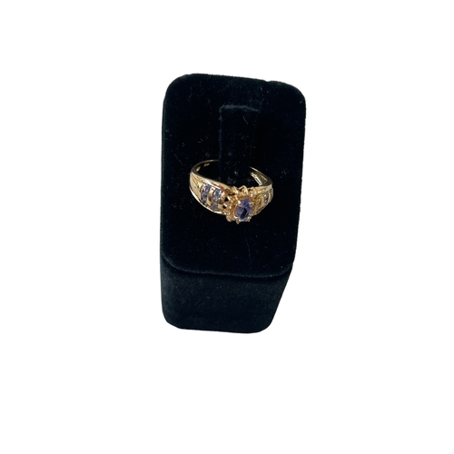 167 - Tanzanite and diamond fancy 10k gold ring, size N.