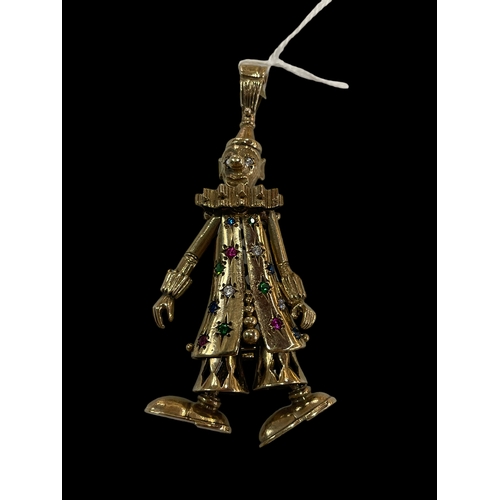 182 - Clown pendant in 9 carat gold set with emeralds, rubies, sapphires and diamonds, 8.5cm drop.