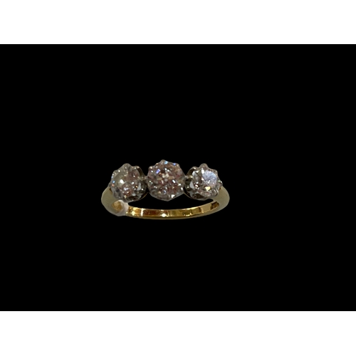 190 - Three stone diamond 18 carat gold ring, total approximately 1.5 carat, size N.