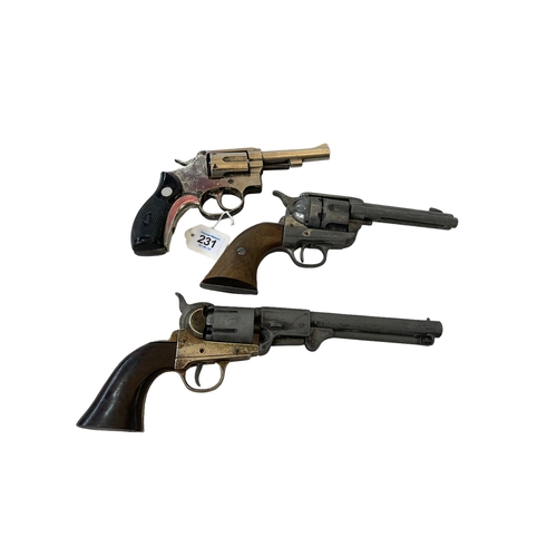 231 - Three replica revolvers.
