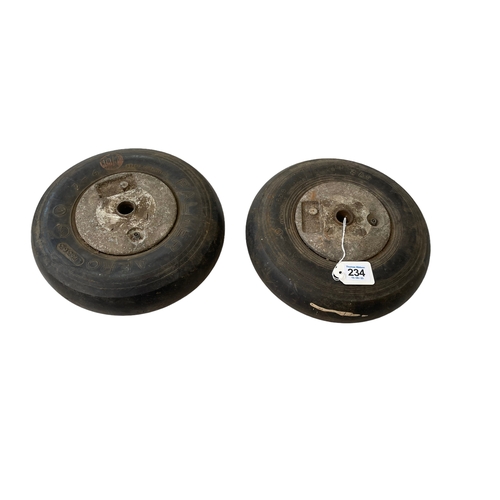 234 - Two Supermarine Spitfire tail wheels.
