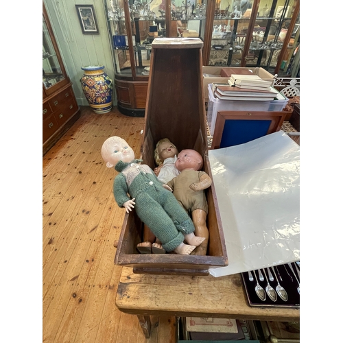 24 - Vintage rocking crib and two pot and one celluloid dolls.