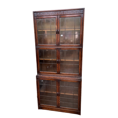 383 - Early 20th Century Gunn oak three height stacking bookcase with six leaded glazed doors, 191cm by 87... 