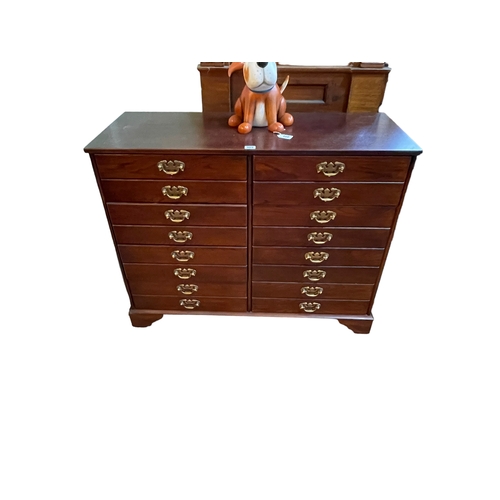 385 - Mahogany finish filing chest of two banks of four drawers raised on bracket feet, 99cm by 40cm.