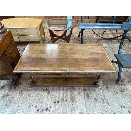 391 - Oak and line inlaid rectangular two drawer low centre table with undershelf, 46.5cm by 130cm by 65cm... 