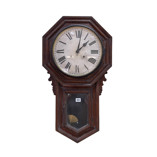 409 - Oak cased Ansonia wall clock, 79cm.