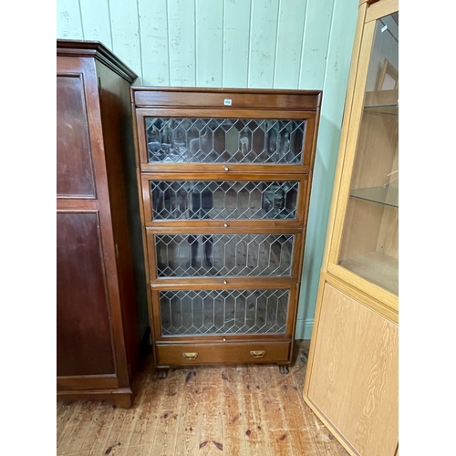 410 - Early 20th Century mahogany four height leaded glazed door bookcase with base drawer, 166.5cm by 86.... 