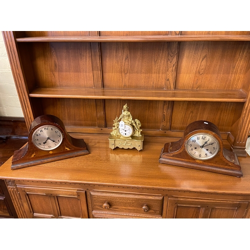 69 - Two vintage inlaid mantel clocks and a gilt figural mantel clock.