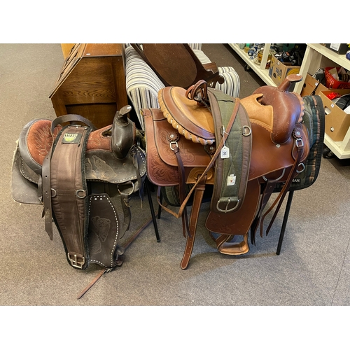 92 - Two Western saddles with accessories.