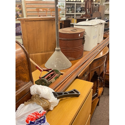 103 - Vintage child's lawn mower, posser, hat box and two enamel bread bins.