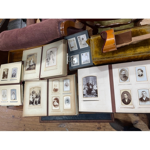 118 - Collection of cabinet portraits and CDV photographs housed in albums, stereoview cards with viewer a... 