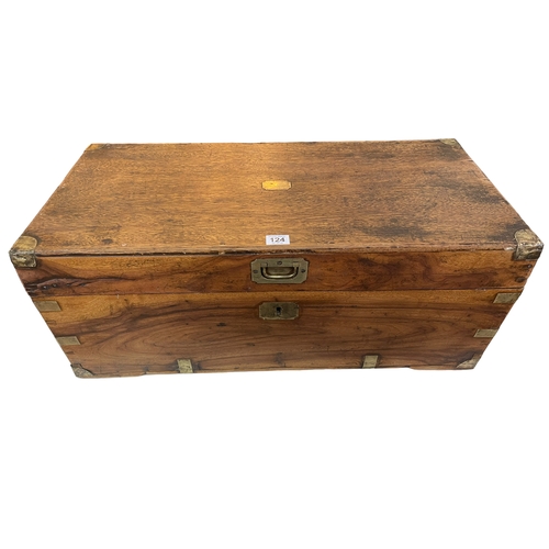 124 - Vintage brass bound campaign style trunk.