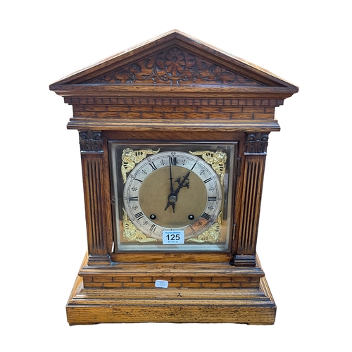 125 - Victorian architectural oak and gilt framed bracket clock, 42cm high.