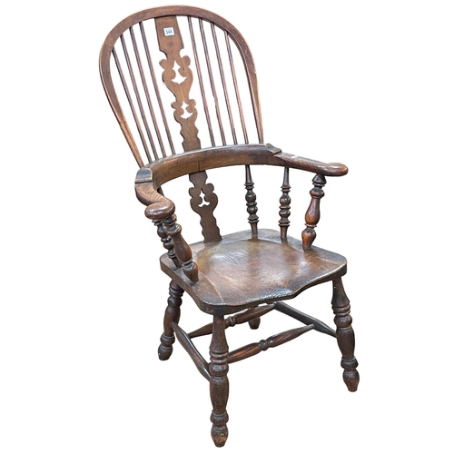 344 - Antique Windsor pierced splat back elbow chair.