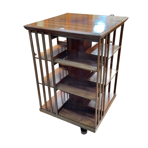 359 - Mahogany three tier revolving bookcase, 103.5cm by 64cm by 64cm.