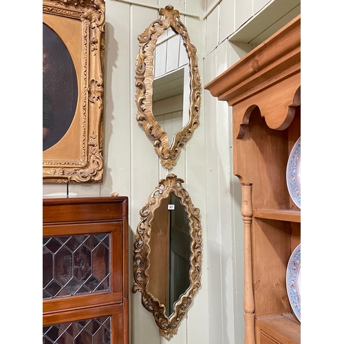 361 - Pair oval gilt framed wall mirrors, 80cm by 35cm.