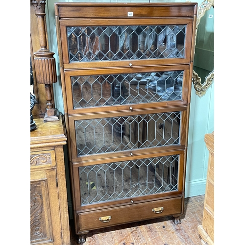 362 - Early 20th Century mahogany four height leaded glazed door bookcase with base drawer, 166.5cm by 86.... 