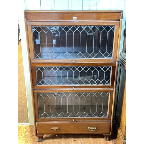 365 - Early 20th Century mahogany three height leaded glazed door bookcase with base drawer, 143cm by 87cm... 