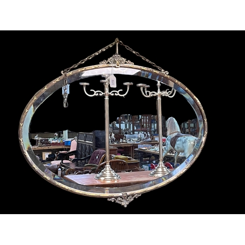 370 - Good 1920's electro-plated framed oval bevelled wall mirror, 61cm by 78cm.