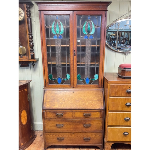 371 - Early 20th Century oak leaded glazed bureau bookcase, 215cm by 98cm by 47cm.