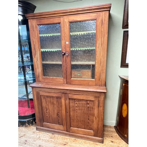 373 - Victorian pitch pine kitchen dresser having two glazed panel doors above two cupboard doors, 207cm b... 