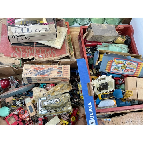 39 - Three boxes of vintage toys, model vehicles, Streamline Speedway, etc.