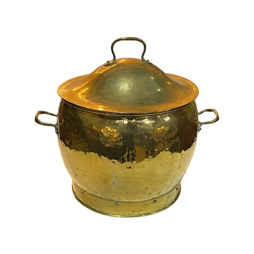 128 - Ornate beaten brass coal bucket with lid, 47cm.