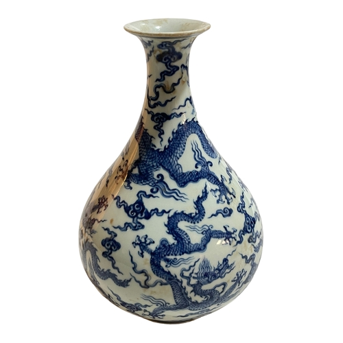 150 - Blue and white Chinese ovoid vase decorated with dragons, six character Chenghua mark to base, 27cm.