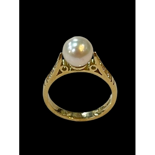 192 - Pearl and diamond 18 carat gold ring, size K.