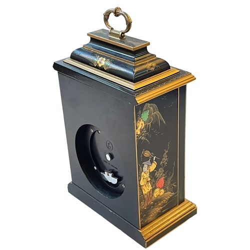 217 - Elliott mantel clock with chinoiserie decorated case, 28cm to top of handle.