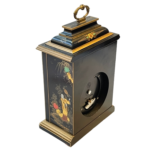 217 - Elliott mantel clock with chinoiserie decorated case, 28cm to top of handle.