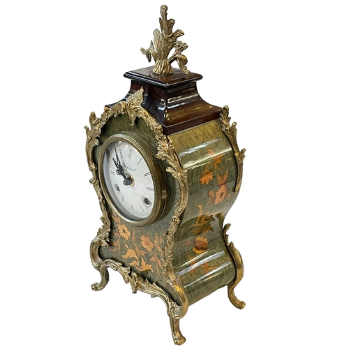 218 - Italian ornate gilt mounted mantel clock with German striking movement, 37cm.