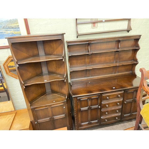 302 - Ercol Old Colonial ten piece dining suite comprising shelf back dresser, standing corner cabinet, pl... 