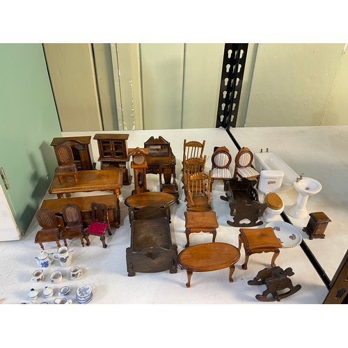 68 - Large three storey Georgian Town House style dolls house with a selection of furniture.