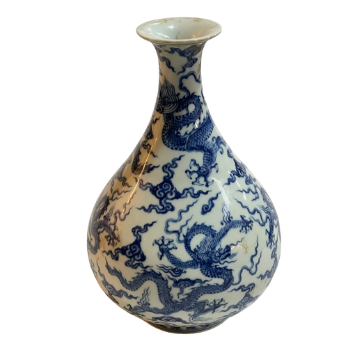 173 - Blue and white Chinese ovoid vase decorated with dragons, six character Chenghua mark to base, 27cm.