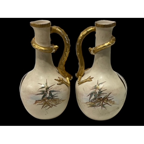 280 - Pair of Continental vases with rooster decoration and lizard handles, 25cm.