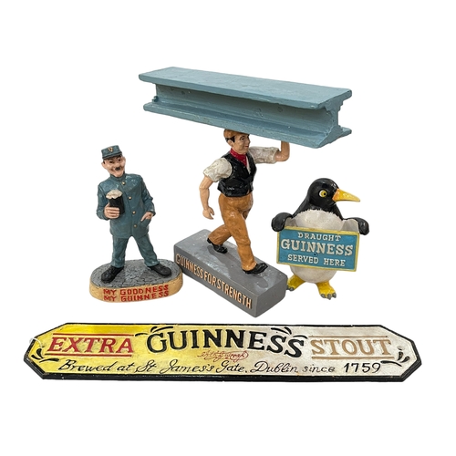 45 - Cast metal Guinness sign and three Guinness advert figures.