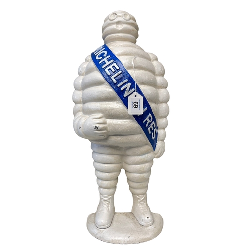 69 - Cast metal model of The Michelin Man.