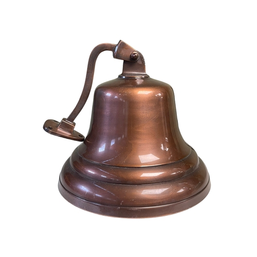 56 - Bronzed ships bell, 25cm high.